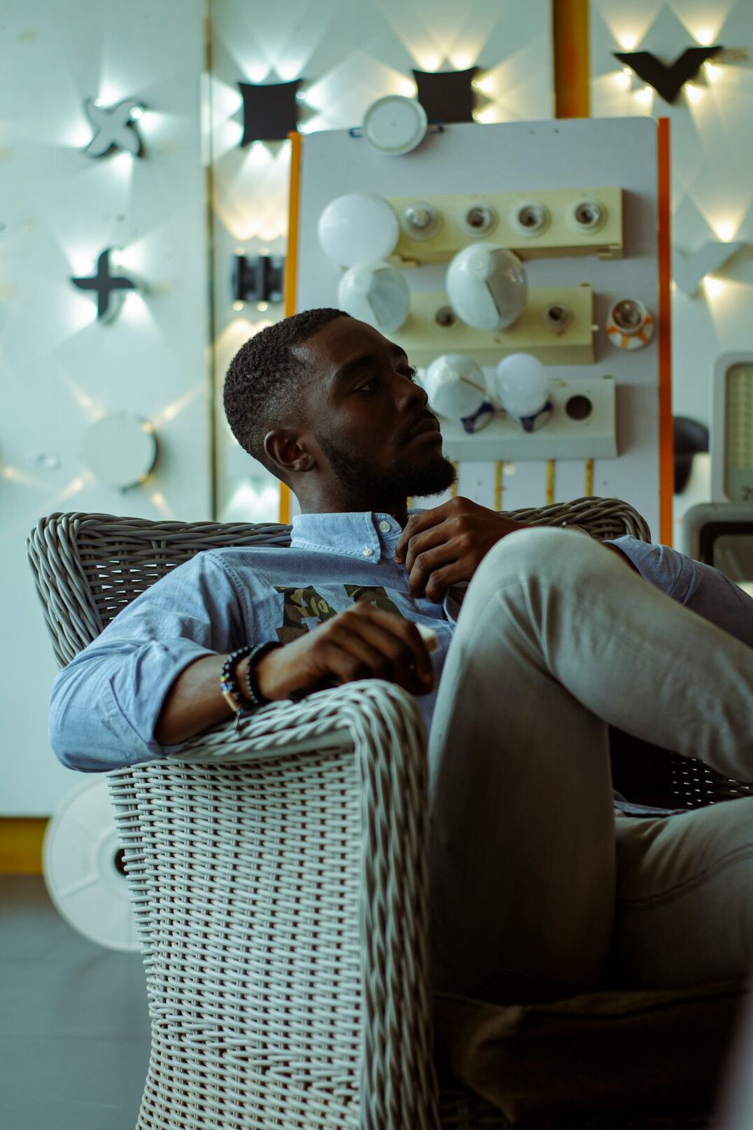 Portrait of a male lighting technician sitting on a chair